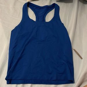 Swiftly tech race back tank top 2.0. Color is SYMPHONY BLUE